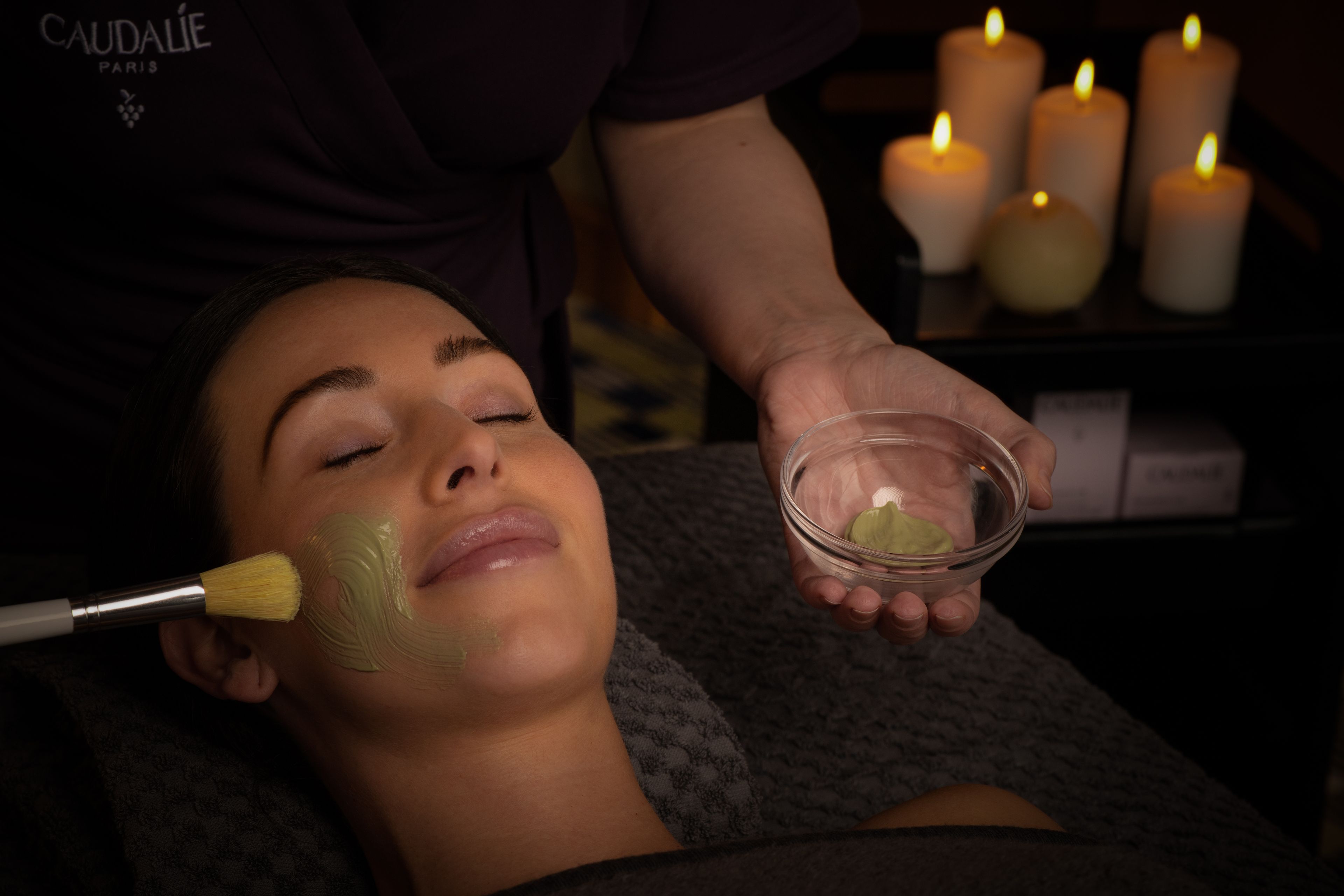 A lady receiving a face mask